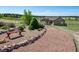 Ranch home features a long driveway and rock-lined flower beds at 40121 County Road 21, Elizabeth, CO 80107