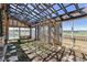 Sunlit greenhouse with partial shade and view of surrounding landscape at 40121 County Road 21, Elizabeth, CO 80107