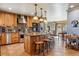 A beautifully designed kitchen with a large island, stainless steel appliances, and custom wood cabinets at 40121 County Road 21, Elizabeth, CO 80107