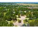 Overhead view of neighborhood entrance, clubhouse, and other community amentities at 8571 Gold Peak Dr # F, Highlands Ranch, CO 80130