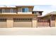 Spacious two-car garage with an additional single-car garage on the side at 8571 Gold Peak Dr # F, Highlands Ranch, CO 80130
