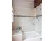 Modern shower featuring a glass door, tiled walls, and a rainfall showerhead, providing a spa-like experience at 8766 Cresthill Ln, Highlands Ranch, CO 80130