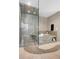 Relaxing bathroom with soaking tub and walk-in shower at 1800 Lawrence St # 505, Denver, CO 80202