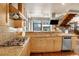 Granite countertop kitchen with stainless steel appliances at 1800 Lawrence St # 505, Denver, CO 80202