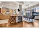 Light wood kitchen cabinets, granite counters, and stainless steel appliances at 1800 Lawrence St # 505, Denver, CO 80202