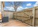 Cozy fenced-in back yard with air conditioner for hot summer days at 3667 W Union Ave # 2E, Denver, CO 80236