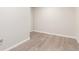 Finished basement with wood-look flooring at 3667 W Union Ave # 2E, Denver, CO 80236