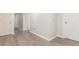 Finished basement with wood-look flooring and easy access at 3667 W Union Ave # 2E, Denver, CO 80236