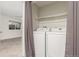 Laundry featuring Samsung washer and dryer, located off the bedroom at 3667 W Union Ave # 2E, Denver, CO 80236