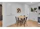 Cozy dining area adjacent to the kitchen and living room, creating a comfortable living space at 7126 Joan St, Denver, CO 80221