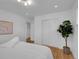 Bright bedroom featuring neutral walls, natural lighting, and closet storage at 7126 Joan St, Denver, CO 80221