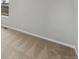 Neutral-toned bedroom with a small window for natural light at 2154 Alyssa St, Fort Lupton, CO 80621