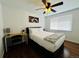 Well-lit bedroom featuring a double bed and a workspace at 2543 Westchester Dr, Denver, CO 80221