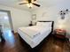 Cozy bedroom with hardwood floors and ensuite bathroom at 2543 Westchester Dr, Denver, CO 80221