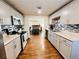 Modern kitchen with stainless steel appliances and granite counters at 2543 Westchester Dr, Denver, CO 80221