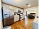 Modern kitchen featuring stainless steel appliances and a view to dining area at 2543 Westchester Dr, Denver, CO 80221