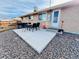 Concrete patio with seating area and grill at 2543 Westchester Dr, Denver, CO 80221