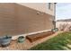 Landscaped backyard with raised garden bed at 19149 E 55Th Ave, Denver, CO 80249