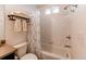 Bright, well-lit bathroom featuring a shower with a bathtub at 19149 E 55Th Ave, Denver, CO 80249