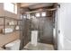 Bathroom with walk-in shower and tile at 19149 E 55Th Ave, Denver, CO 80249