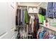 Walk-in closet with shelving and hanging racks for optimal storage at 19149 E 55Th Ave, Denver, CO 80249