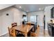 Bright dining area adjacent to the kitchen, perfect for Gathering meals and entertaining at 19149 E 55Th Ave, Denver, CO 80249