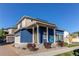 Inviting home with a charming front porch, two car garage and a well maintained landscape at 19149 E 55Th Ave, Denver, CO 80249