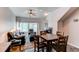Comfortable living area with a dining table and cozy seating, ideal for Gathering gatherings at 19149 E 55Th Ave, Denver, CO 80249