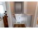 View down the staircase showcasing neutral paint, plush carpeting, and easy access to the home's lower level at 19149 E 55Th Ave, Denver, CO 80249