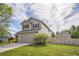 Charming home with a well-maintained lawn, fenced backyard, and a detached garage/shed at 4814 Kingbird Dr, Frederick, CO 80504
