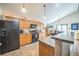 Functional kitchen with modern appliances, breakfast bar, and ample cabinet space at 4814 Kingbird Dr, Frederick, CO 80504
