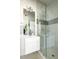 Sleek bathroom with glass shower and contemporary fixtures at 4395 Zuni St, Denver, CO 80211