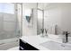 Well-lit bathroom with modern fixtures, a glass-enclosed shower, and contemporary vanity, for a comfortable experience at 4395 Zuni St, Denver, CO 80211
