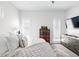 Serene bedroom with plantation shutters, soft bedding, and neutral decor, creating a peaceful retreat at 4395 Zuni St, Denver, CO 80211