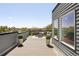 Spacious rooftop deck with comfortable seating, city views, perfect for outdoor entertaining and relaxation at 4395 Zuni St, Denver, CO 80211