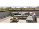 Relaxing rooftop deck with comfortable seating and cityscape views at 4395 Zuni St, Denver, CO 80211