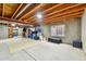 Unfinished basement providing ample storage and potential for customization at 5656 S Sicily Ct, Aurora, CO 80015