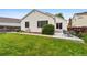 Lovely patio with outdoor seating, a concrete surface, and a grassy yard at 5656 S Sicily Ct, Aurora, CO 80015