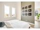 Minimalist bedroom with two large windows allowing for tons of natural light at 9181 W Eaton St, Westminster, CO 80031