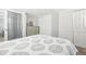 Inviting bedroom with neutral tones, multiple closets, and soft lighting for a relaxing atmosphere at 4180 S Elati St, Englewood, CO 80110