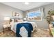 Relaxing bedroom featuring bright sunlight, neutral decor and a beautiful view at 9195 E Lehigh Ave # 190, Denver, CO 80237