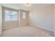 Spacious bedroom with neutral walls and carpet at 9657 Browns Peak Cir, Littleton, CO 80125