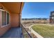 Private deck with mountain views and a partially visible community at 9657 Browns Peak Cir, Littleton, CO 80125