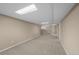 Spacious finished basement area featuring neutral carpet, stairway and recessed lighting at 11704 Elk Head Range Rd, Littleton, CO 80127