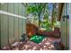 Cozy patio area with table and chairs, privacy fence and brick wall at 11704 Elk Head Range Rd, Littleton, CO 80127