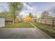 Large backyard with a concrete patio and fire pit, ideal for gatherings and enjoying the outdoors at 3620 N Saint Paul St, Denver, CO 80205