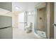 Modern bathroom featuring glass enclosed shower, toilet, and storage cabinets at 3620 N Saint Paul St, Denver, CO 80205