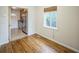Inviting dining area with hardwood floors and view into the well-equipped kitchen at 3620 N Saint Paul St, Denver, CO 80205