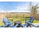 The home features a well-maintained backyard with a fire pit and picturesque views at 6276 Turnstone Pl, Castle Rock, CO 80104