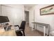 The bedroom includes a desk, office chair, closet and an open doorway to the rest of the house at 6276 Turnstone Pl, Castle Rock, CO 80104